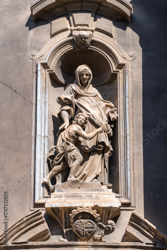 Baroque sculpture of Saint Anne and child on church facade in Palermo, Sicily