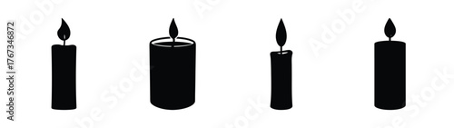 Four silhouettes of burning candles with flickering flames in simple style