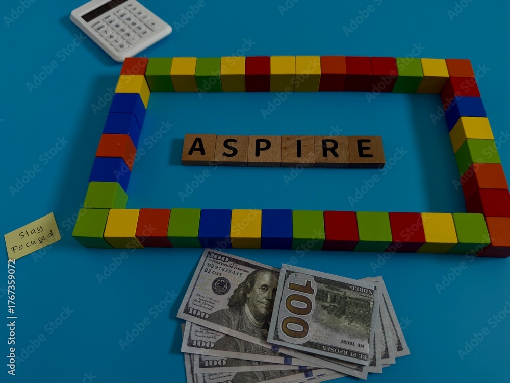 Obraz premium Money and Building Blocks Representing Financial Aspirations