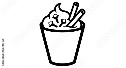 Delicious beverage with cinnamon sticks and cloves perfect for cozy moments.