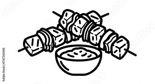 Delicious grilled skewers with a side of creamy dipping sauce perfect for a meal.