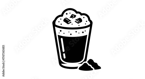 Delicious iced coffee with ice cubes and coffee grounds refreshing drink.