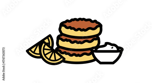 Delicious stack of pancakes with lemon slices and a bowl of cream.