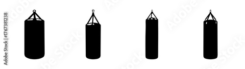 Four black punching bags hanging different styles for boxing training