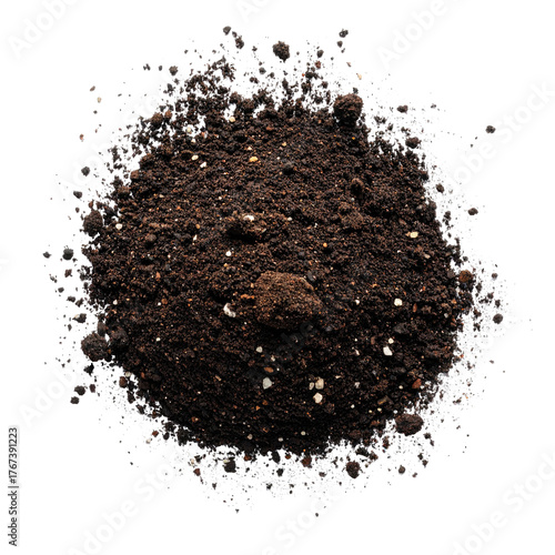 A top-down view of rich, dark potting mix with visible organic matter, isolated on black