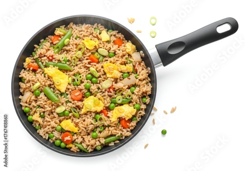 Deliciously cooked rice dish with fresh vegetables in a frying pan overhead view