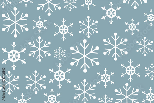 Muted blue-gray background with a scattered pattern of various sized white snowflakes. Modern, simple vector design perfect for winter backgrounds and holiday graphic assets.