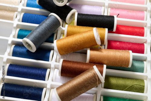 Wallpaper Mural spools of multicolored sewing thread Torontodigital.ca