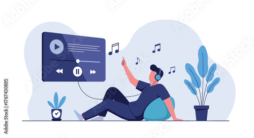 A person wearing headphones enjoys listening to music from a media player while relaxing indoors.