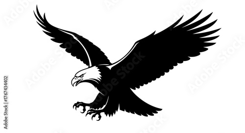 Powerful silhouette of a bald eagle in flight with wings spread wide and talons extended
