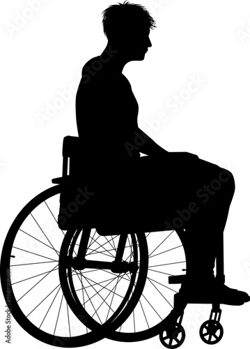 Silhouette of a man sitting in a wheelchair