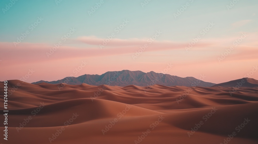 Naklejka premium Desert landscape at sunset, soft focus. Mountains in distance