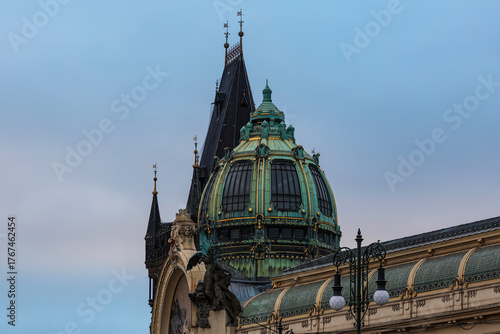 Photography Green dome roof of Municipal House in Prague, Czech Republic, captured at dusk