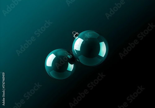 Two Floating Teal Christmas Ornaments in Darkness Keywords: Christmas, ornament, teal, glossy