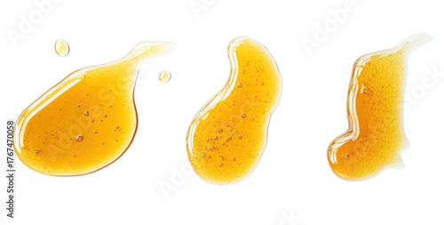 honey drops on white background
