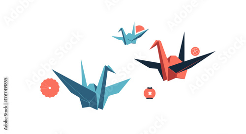 Three colorful Japanese origami paper cranes in flight.