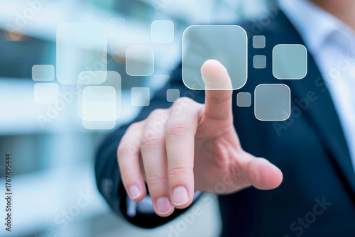 A hand touching a virtual screen with multiple transparent squares on it