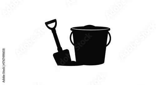 Silhouette of a shovel and bucket filled with soil ready for gardening or construction projects silhouette
