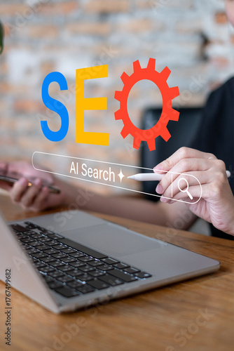 Businessman using laptop analyzing seo search engine optimization website data analysis to boost search result global research technology keyword network content online information social marketing