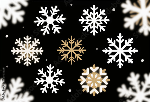 White and gold snowflakes floating against black background, minimalist winter design