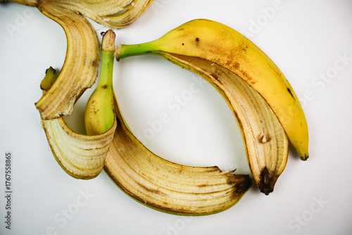 Banana peel on a white isolated background. Banana peels. Yellow banana peel.