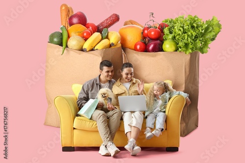 Happy family with laptop si...