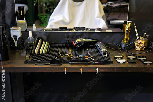 A well-organized barber shop with a variety of tools and products