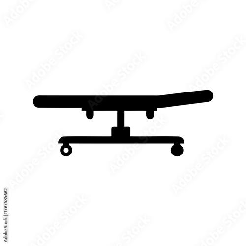 Medical examination table silhouette with adjustable headrest and rolling base stand