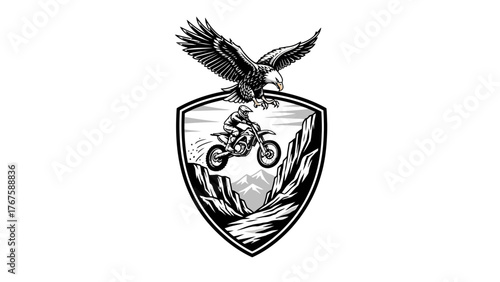 A crest featuring an eagle above a rider jumping a motorcycle in a mountain landscape