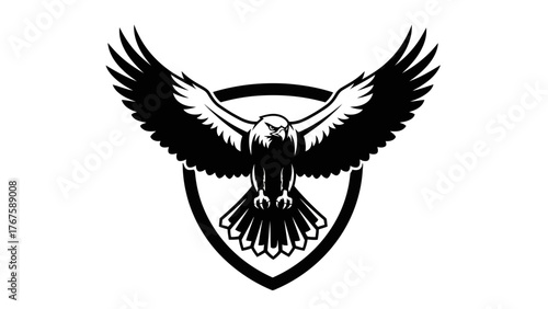 A monochrome illustration of a bird with outstretched wings within a shield