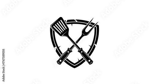 A black emblem features a spatula and fork crossed, behind an edgy shield shape on a white background