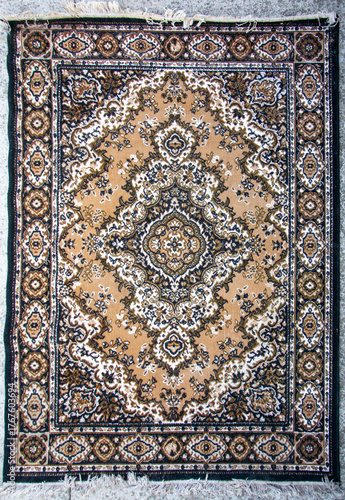 Vintage oriental carpet with classic ornamental medallion pattern top view