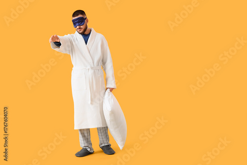 Male sleepwalker with pillo...