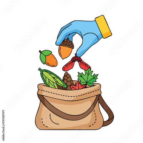 A gloved hand collects autumn harvest into a bag.