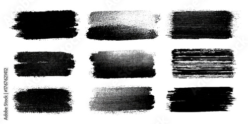 Hand drawn black grunge brush strokes and textured ink marks .Abstract artistic paint smear collection for backgrounds .grunge brush texture set rough, textured and artistic stroke design .
