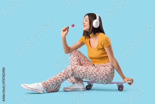 Young woman in headphones w...