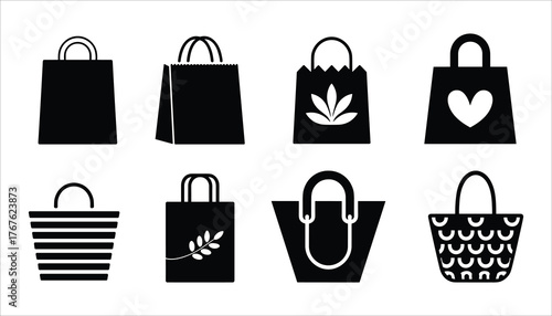Collection of eight black shopping bags with diverse designs and handles carrier retail