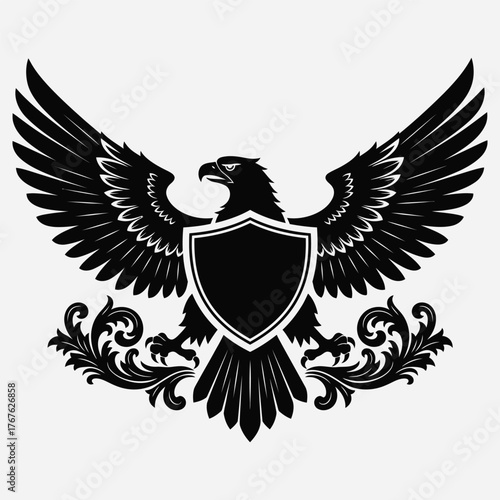 Regal eagle crest with outstretched wings and a central shield, featuring intricate vintage scroll details for a powerful insignia