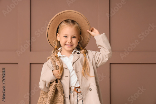 Stylish little girl in hat ...