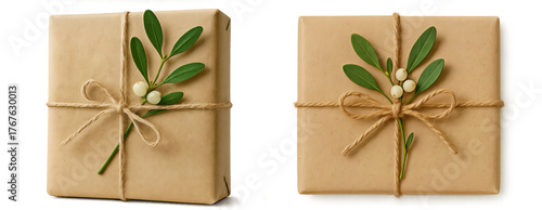 Eco style gift boxes wrapped in kraft paper with sprig of mistletoe — natural Christmas and New Year packaging