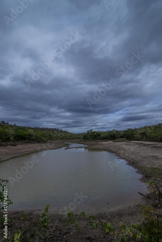 Beautiful lagoon with clouds in the sky and the look of rain, located in the city of Turmalina, MG.