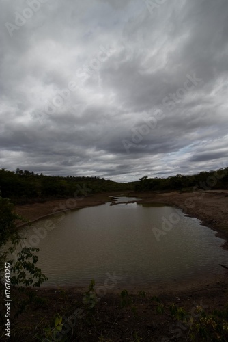 Beautiful lagoon with clouds in the sky and the look of rain, located in the city of Turmalina, MG.