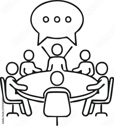 Meeting of people around a table with a speech bubble.