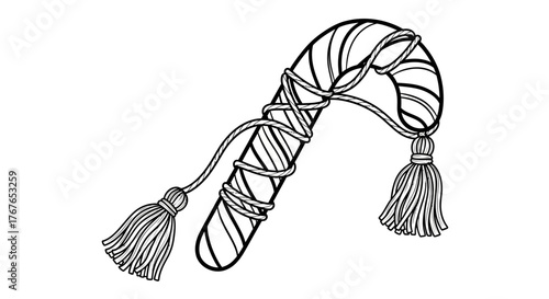 Decorative candy cane with twisted ropes and tassels in black and white