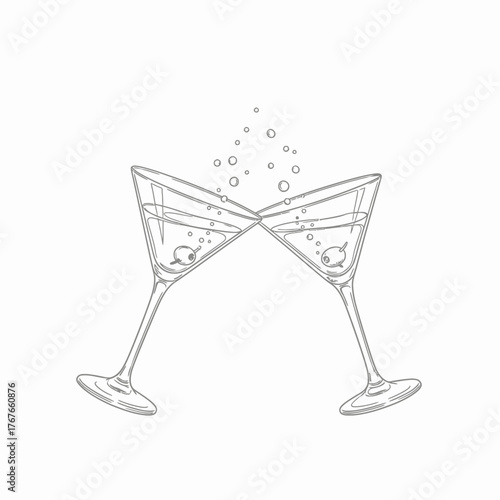 Cheers with two martini glasses and bubbles