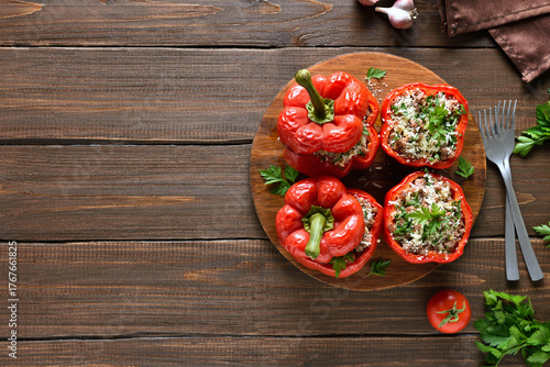 Baked stuffed red bell peppers with minced meat, rice, parmesan