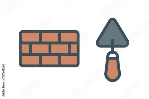 Section of red brick wall and triangular masonry trowel construction tool