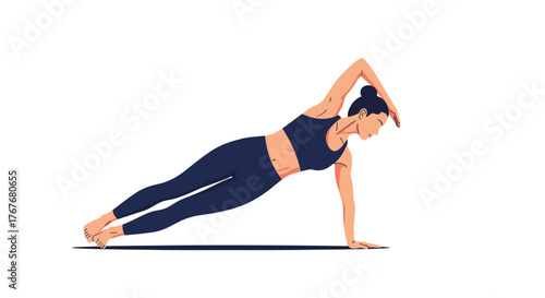 A focused young woman performs a challenging side plank yoga pose on a mat, demonstrating strength, balance, and core stability during her fitness routine.