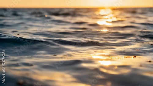 Golden Sunset Reflecting on Rippling Ocean Water Surface Calm Serene Evening Ambiance