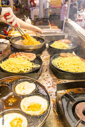 cooking steak spaghetti at vertical composition